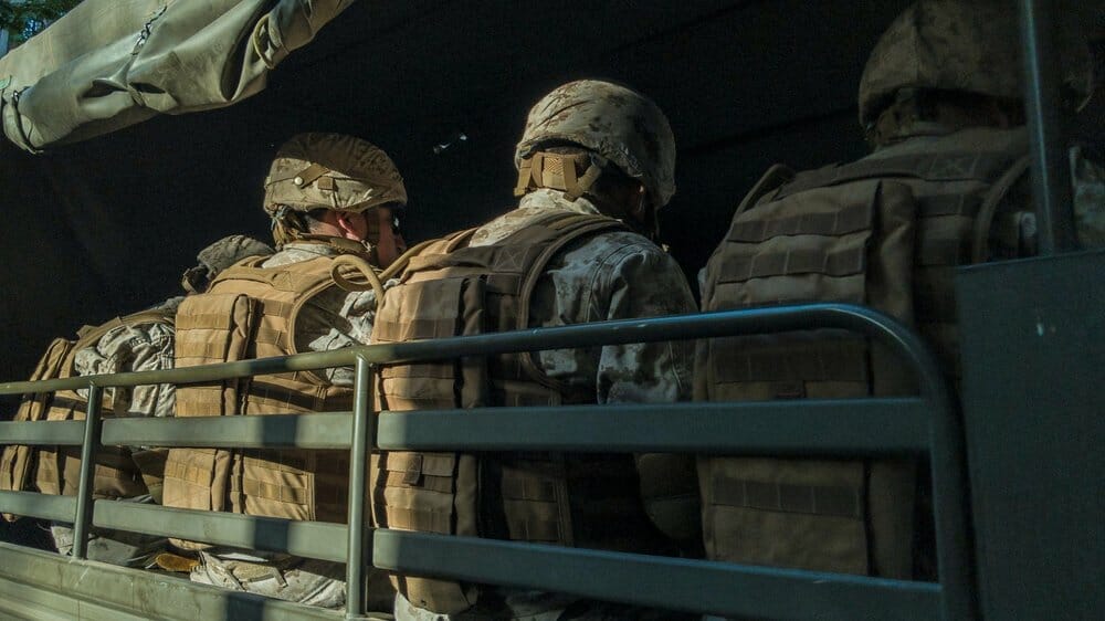 Soldiers sitting in a truck