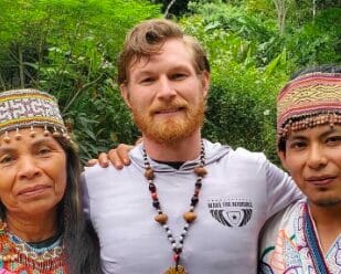 Photo of Kegan with shamans