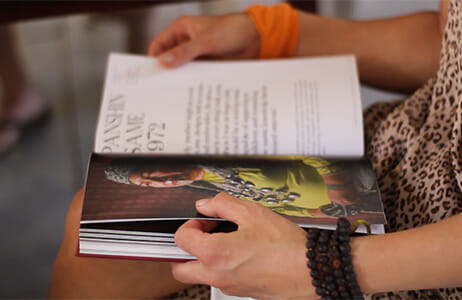 Hands of a person holding a book