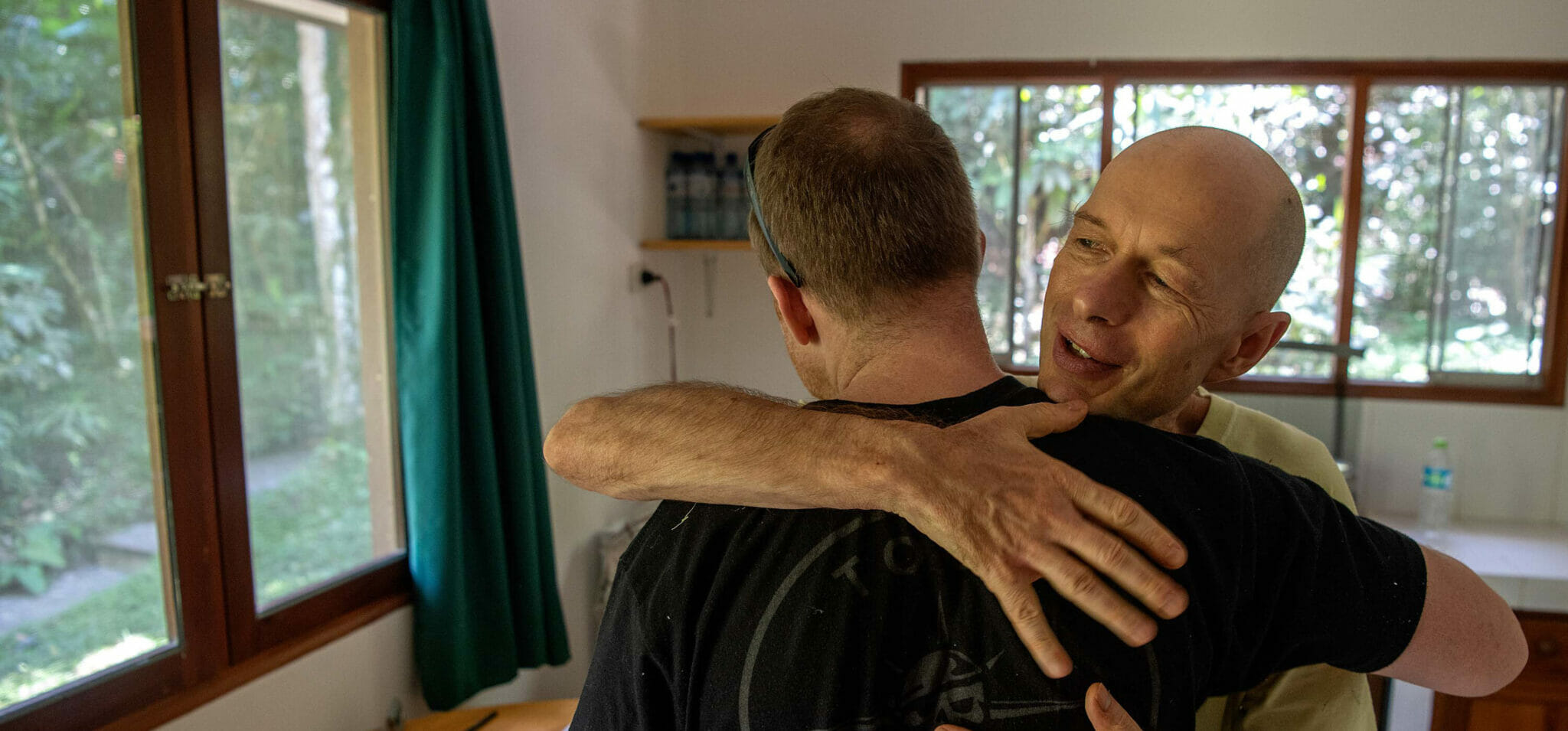 Two retreat participants hugging